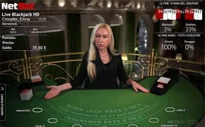Un tavolo blackjack live NetEnt con croupier.