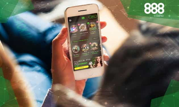 Uno smartphone con la app 888casino e il logo dell'operatore.